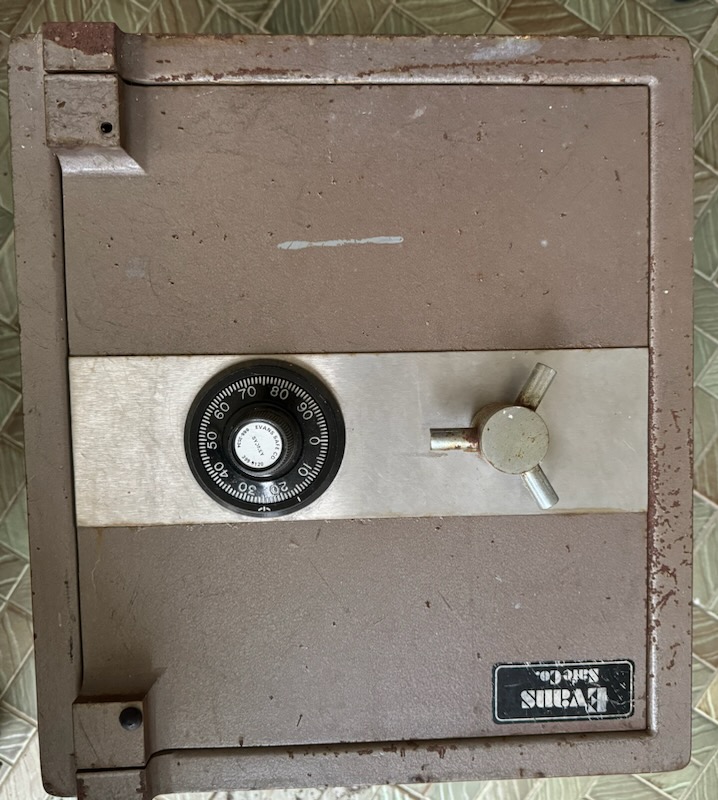 An old Evans Safe Co. combination safe with its dial and handle